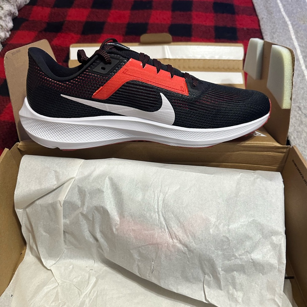 Brand, new, black, red and white Nike Pegasus shoes in box
